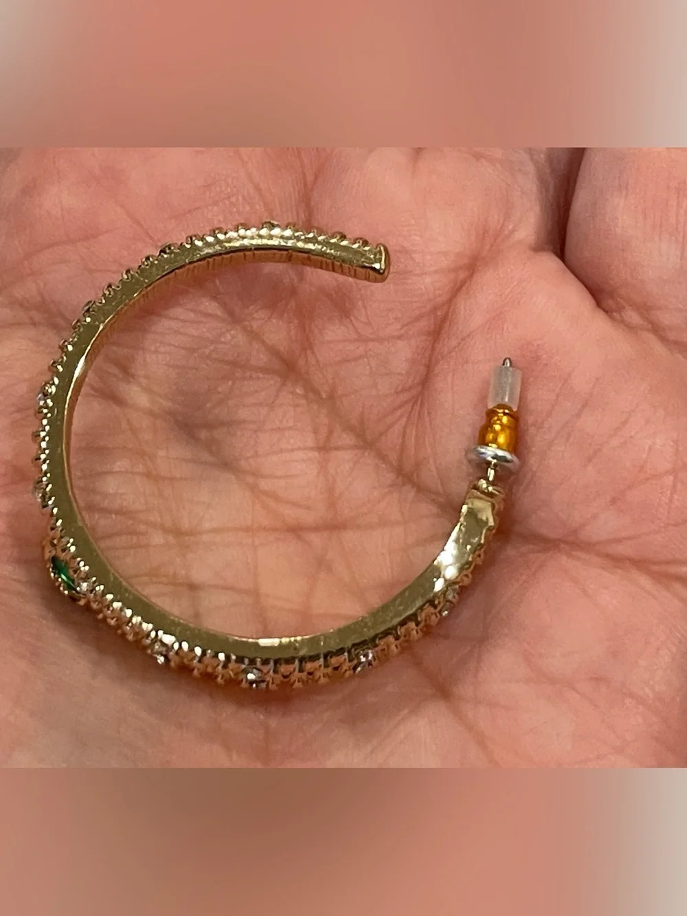 Gold Sparkle Snake Hoop Earrings with Green Eye Stone Accents